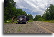 Inflating punctured tire::Maine, United States::
